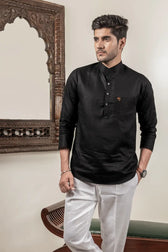 Front view of plain black mandarin collar short kurta on a mannequin