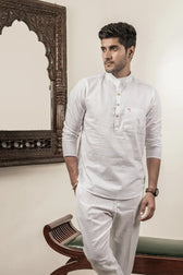 Front view of Cotton Linen Plain White Mandarin Collar Short Kurta on a hanger