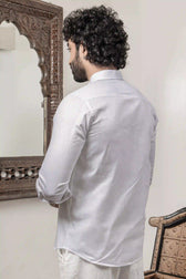 Detail of lightweight fabric texture of white shirt