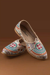 Side view of Handcrafted Embroidered Off White Jutti
