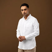 Front view of 100% linen plain white shirt with wooden button detailing.