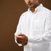 Back view of 100% linen plain white shirt displayed on hanger.