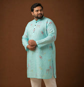 Close-up of the 100% linen fabric texture of the aqua mint long kurta