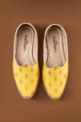 Front view of Handcrafted Yellow Butta Printed Jutti